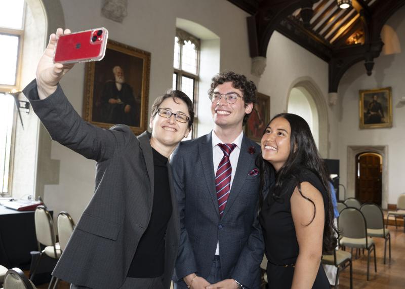 Mariana Mota Prado takes a selfie with Giorgi Kaikatsishvili and Sarah Oberto Monasterios.