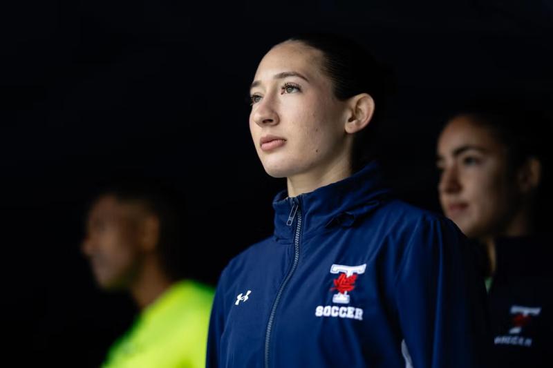 Hannah Chown in her U of T soccer jacket.