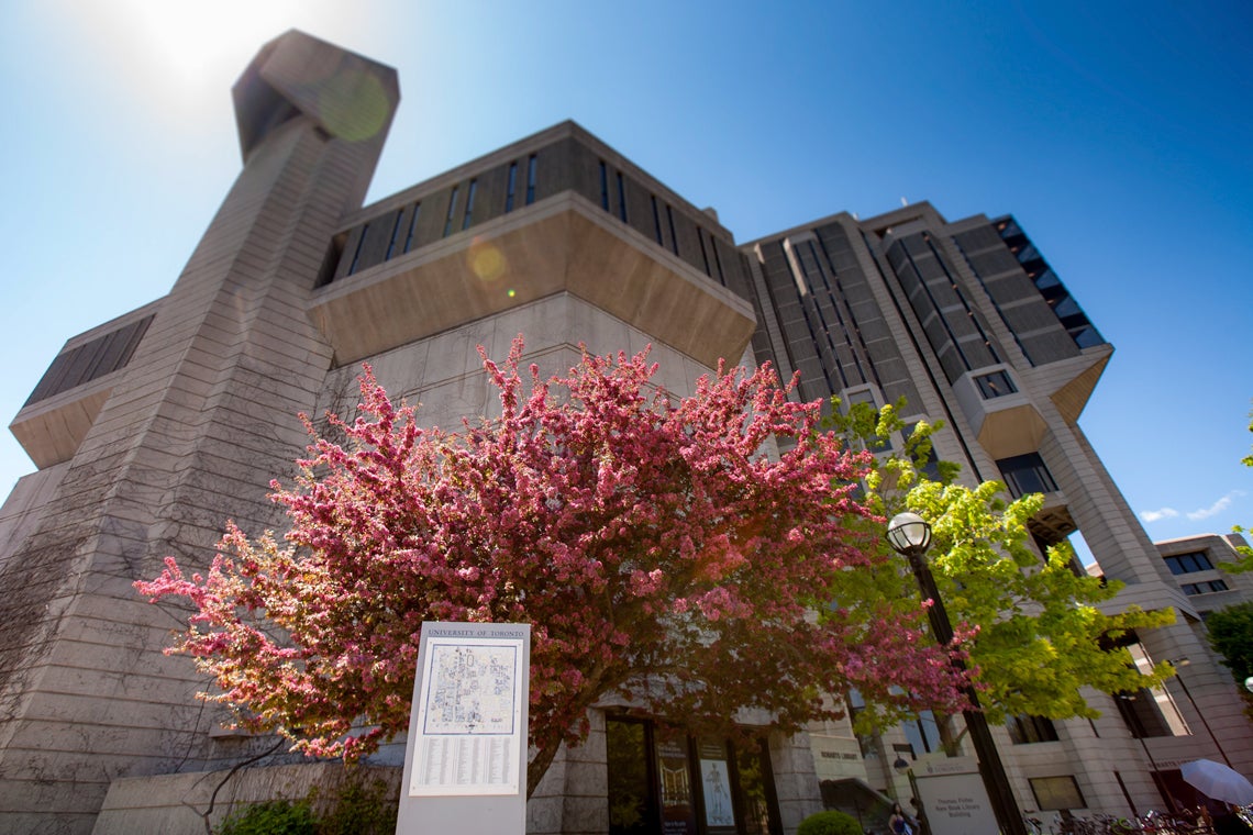 Robarts Library before its expansion, photographed from the street with flowering trees in front