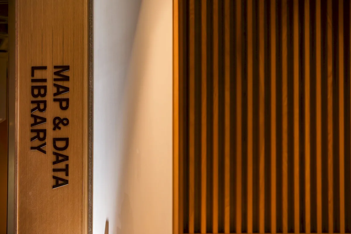 The 2026 Map & Data Library entrance on the transformed fifth floor of Robarts Library, with warm wood slats
